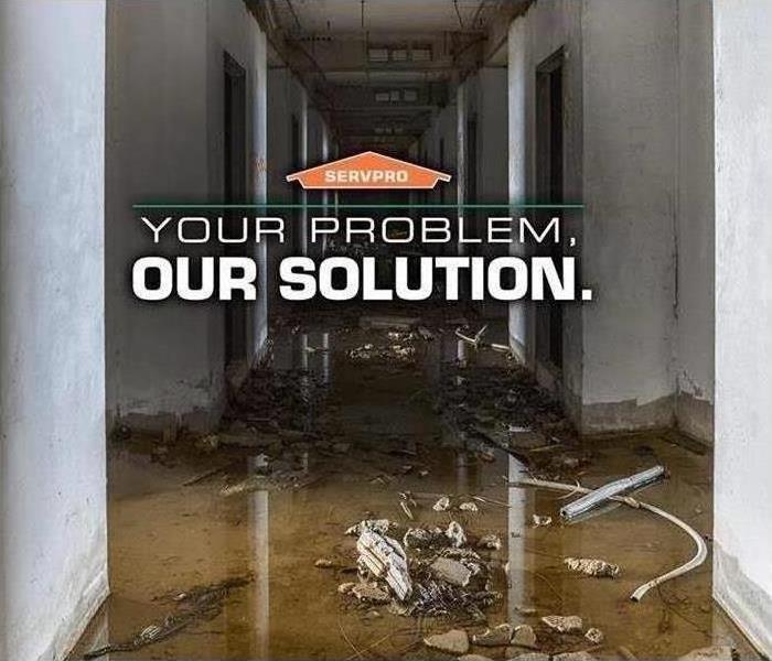 Flooded Hallway with caption "Your Problem. Our Solution."